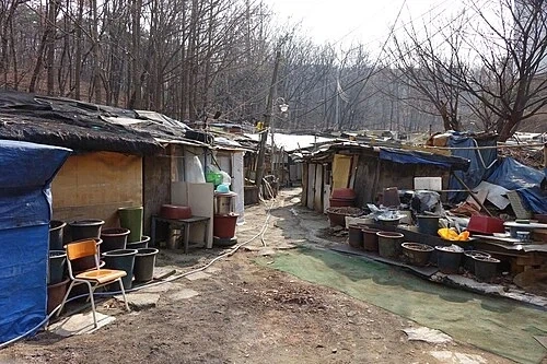 과거 재개발 할 때 그냥 쫒겨나는 경우가 많았던 이유